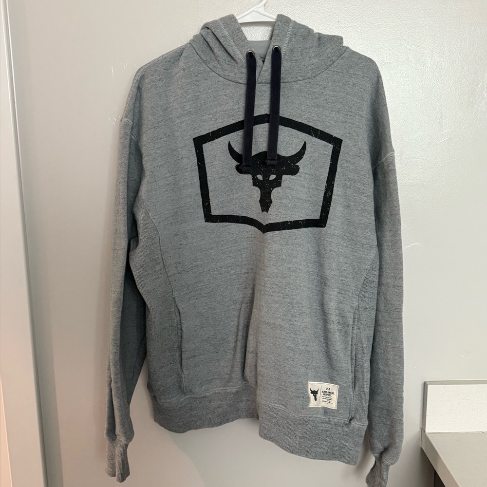 Men’s gray Under Armour Project Rock warm up hoodie. Size Large.